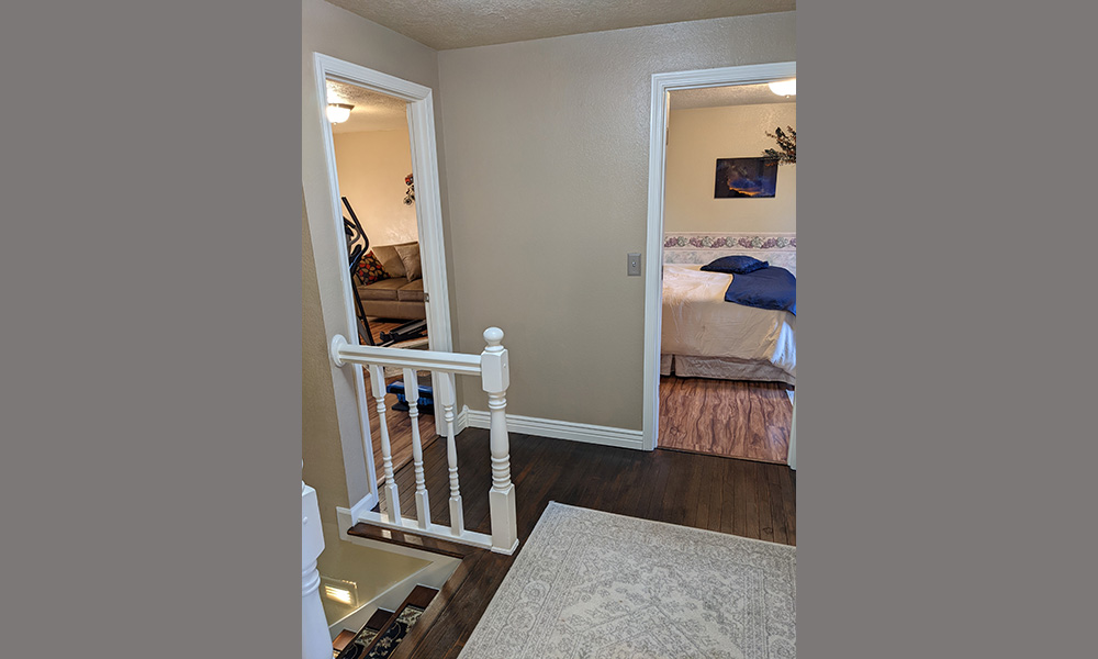 Upstairs Hall View Into Third and Fourth Bedroom (Office)
